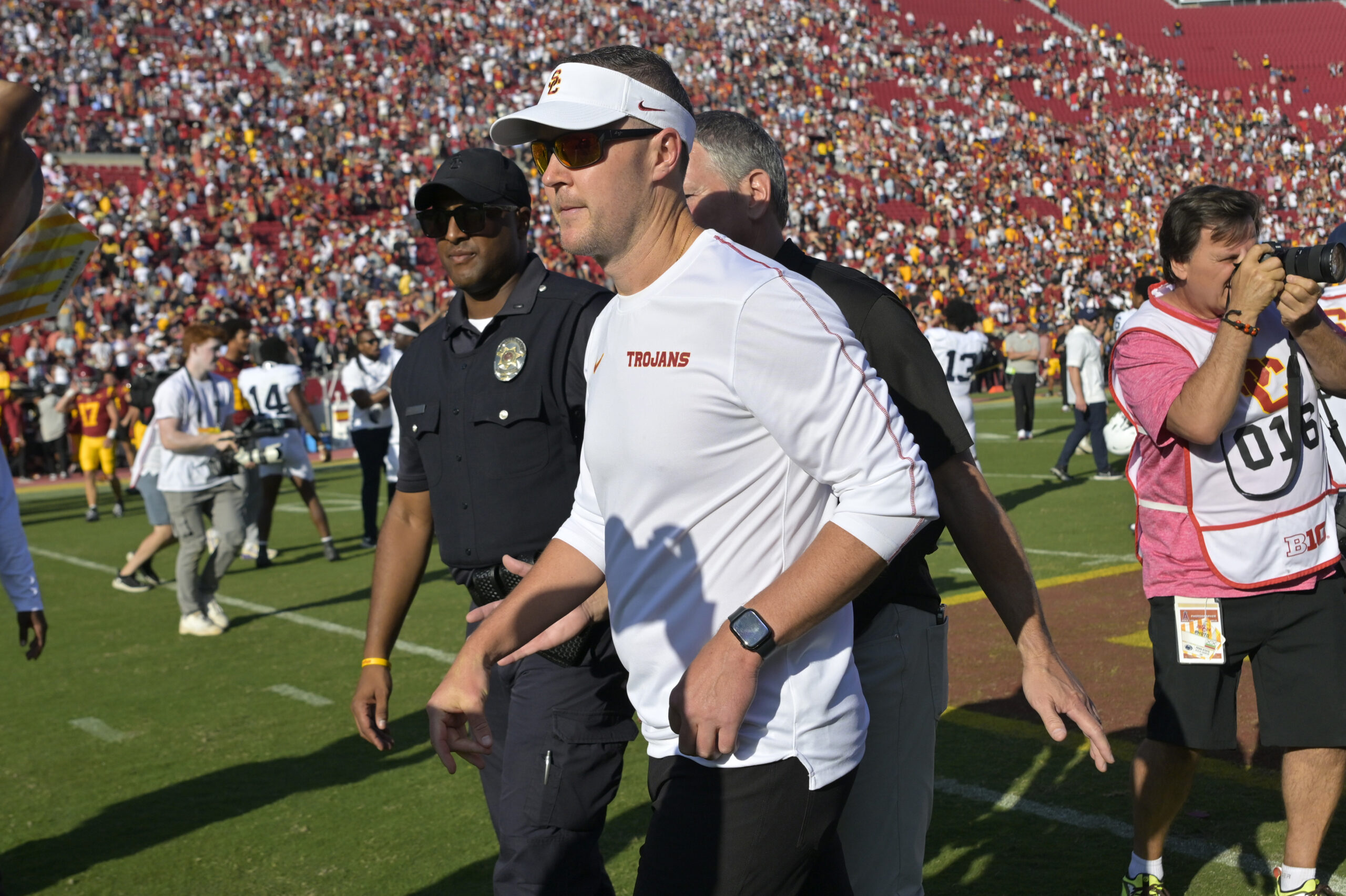 Oct 12, 2024; Los Angeles, California, USA; USC Trojans head coach Lincoln Riley walks off the field following the game against the Penn State Nittany Lions at United Airlines Field at the Los Angeles Memorial Coliseum.