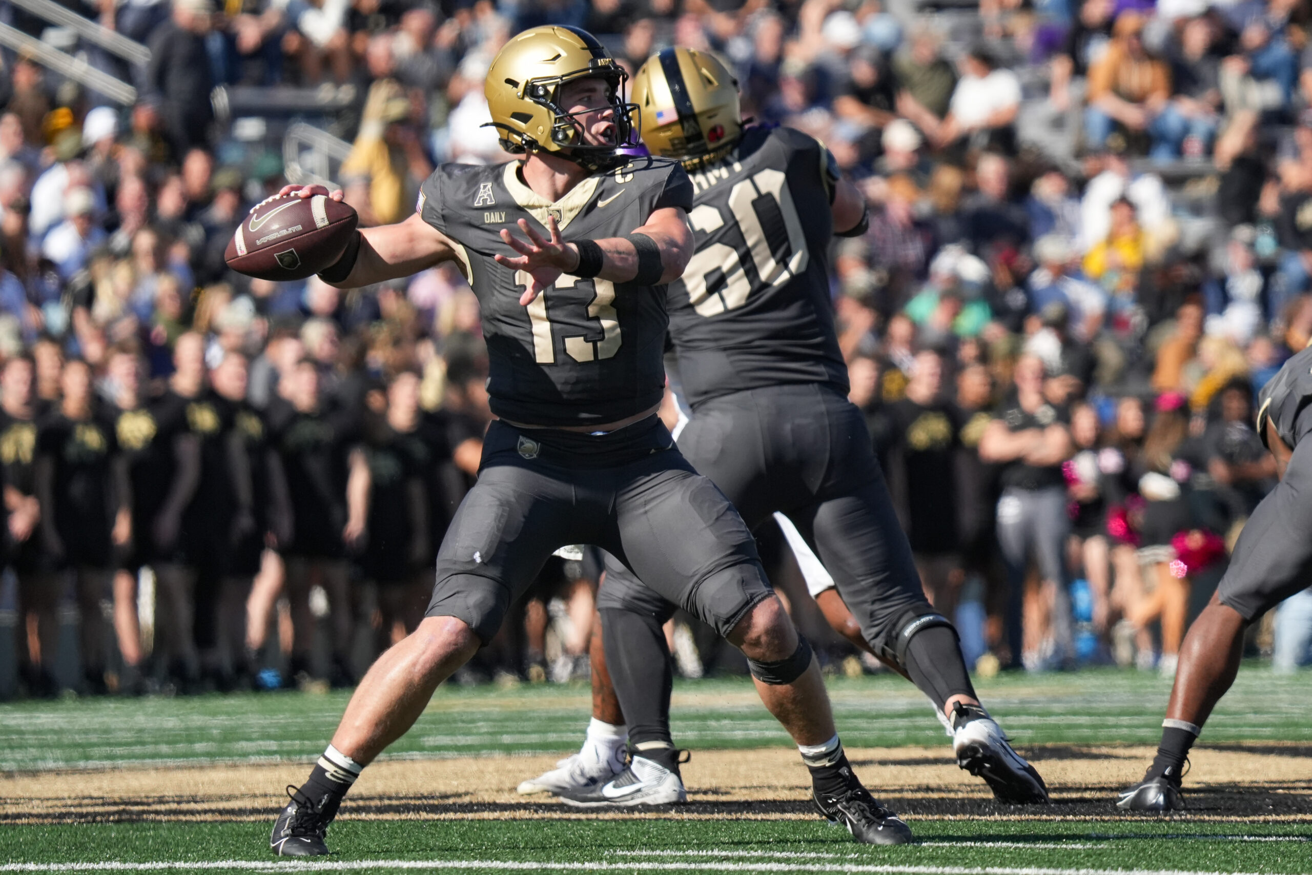 Oct 19, 2024; West Point, New York, USA; Army Black Knights quarterback Bryson Daily (13) passes during the second half against the East Carolina Pirates at Michie Stadium. 