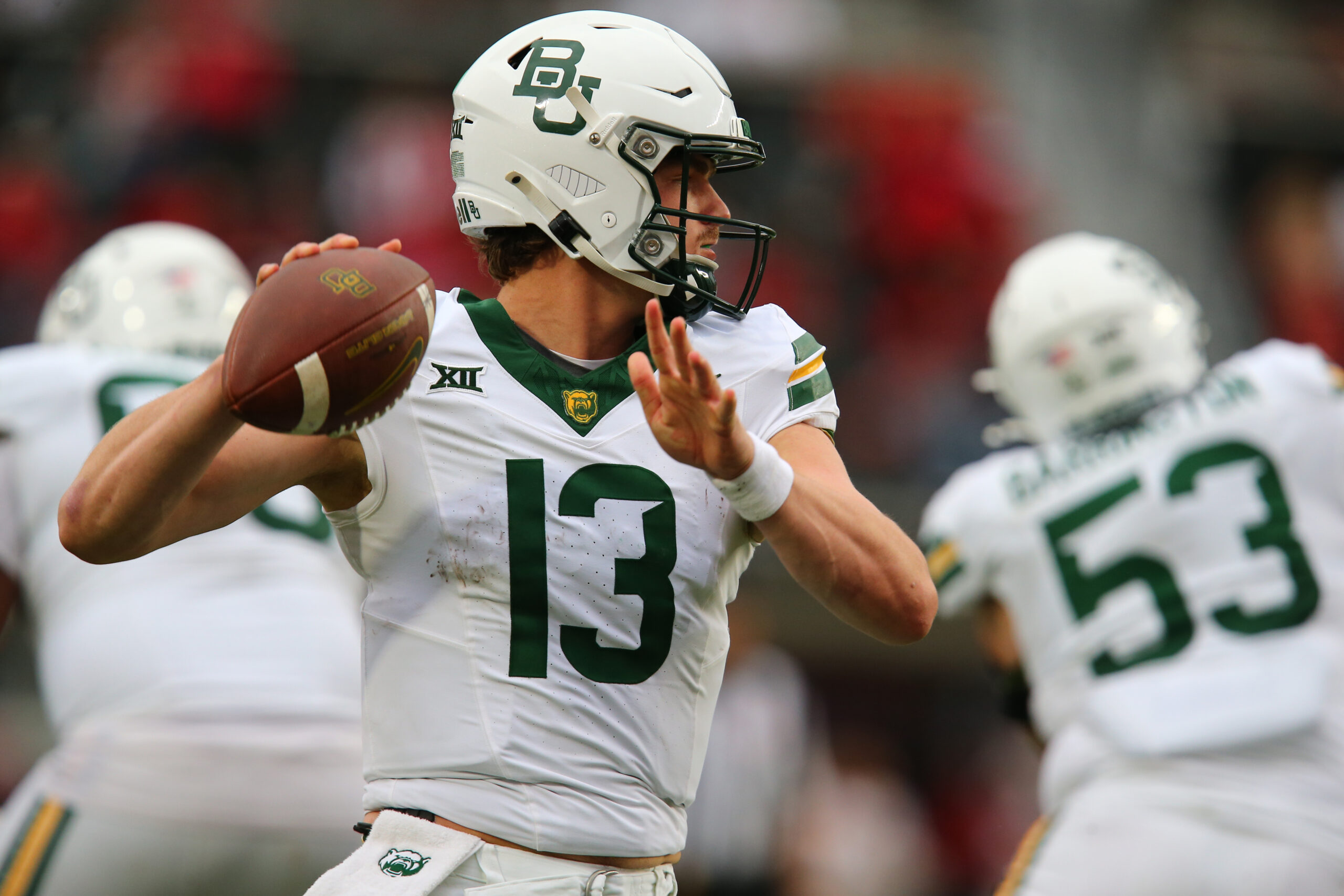 Oct 19, 2024; Lubbock, Texas, USA; Baylor Bears quarterback Sawyer Robertson (13) throws against the Texas Tech Red Raiders in the second half at Jones AT&T Stadium and Cody Campbell Field.
