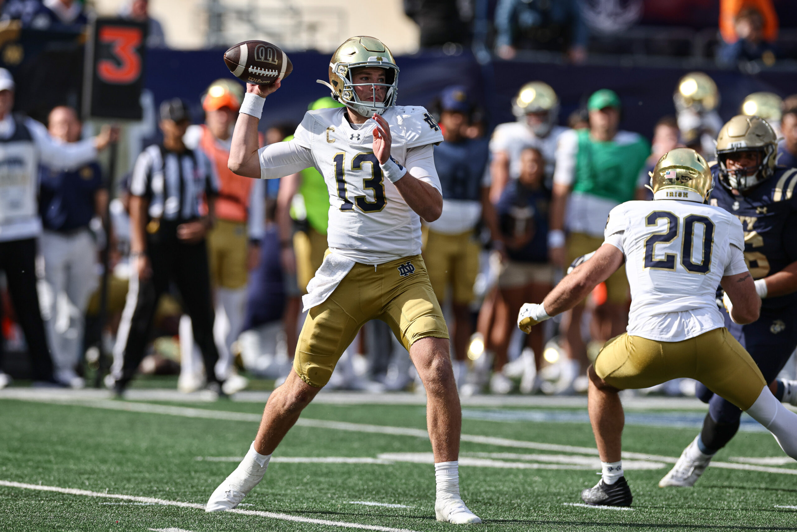 Oct 26, 2024; East Rutherford, New Jersey, USA; Notre Dame Fighting Irish quarterback Riley Leonard (13) throws the ball during the first half against the Navy Midshipmen at MetLife Stadium.