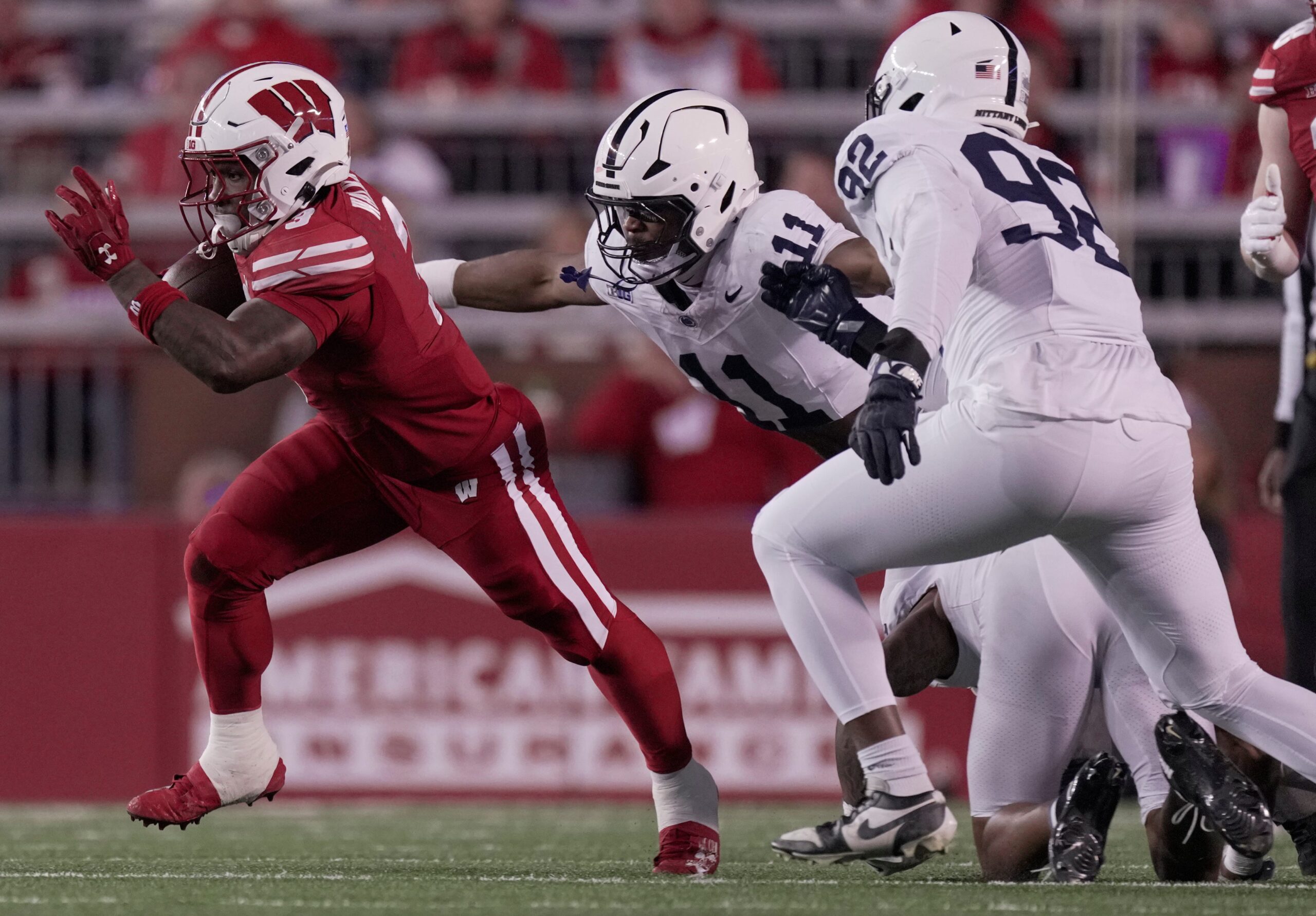 Wisconsin running back Tawee Walker (3) is chased by Penn State defensive end Abdul Carter (11) during the first quarter of their game Saturday, October 26, 2024 at Camp Randall Stadium in Madison, Wisconsin.