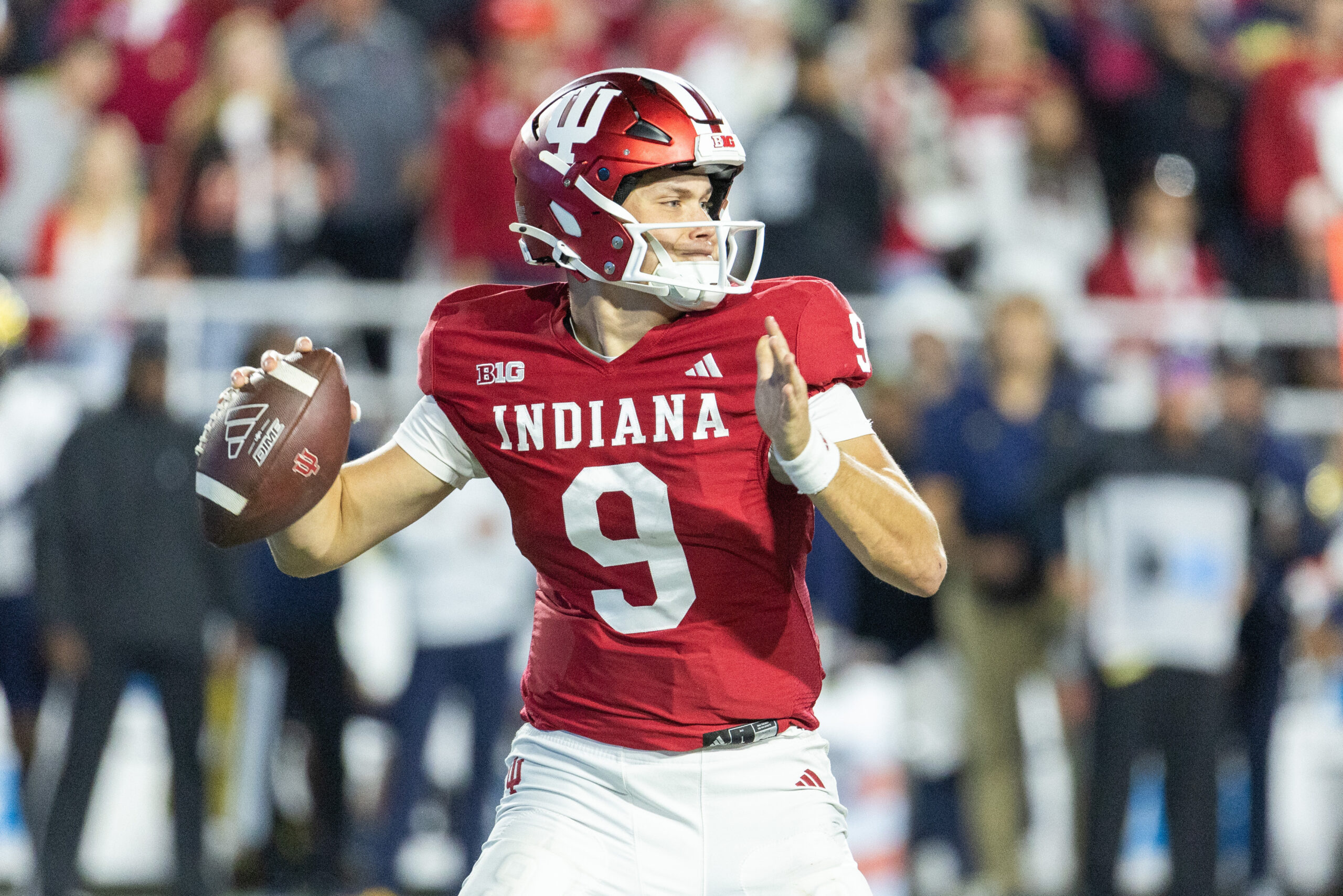 Nov 9, 2024; Bloomington, Indiana, USA; Indiana Hoosiers quarterback Kurtis Rourke (9) passes the ball in the second half against the Michigan Wolverines at Memorial Stadium.
