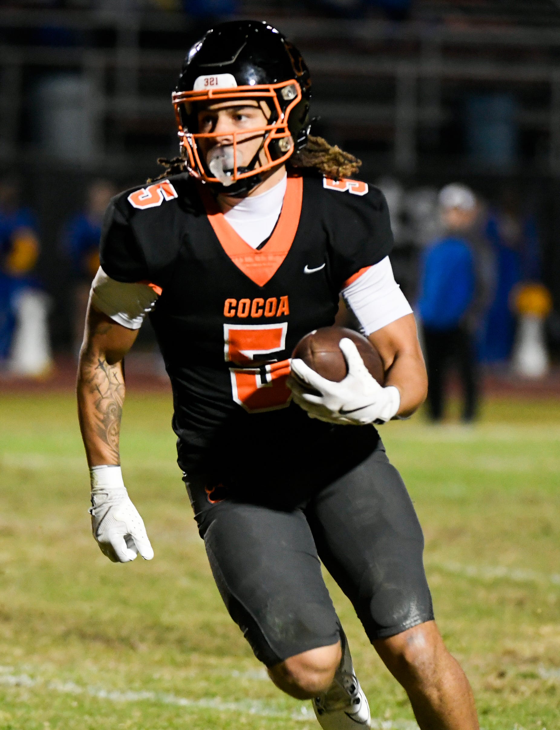 Jayvan Boggs of Cocoa runs the ball against Newberry in the FHSAA Class 2A Region 2 finals, Friday, November 29, 2024.