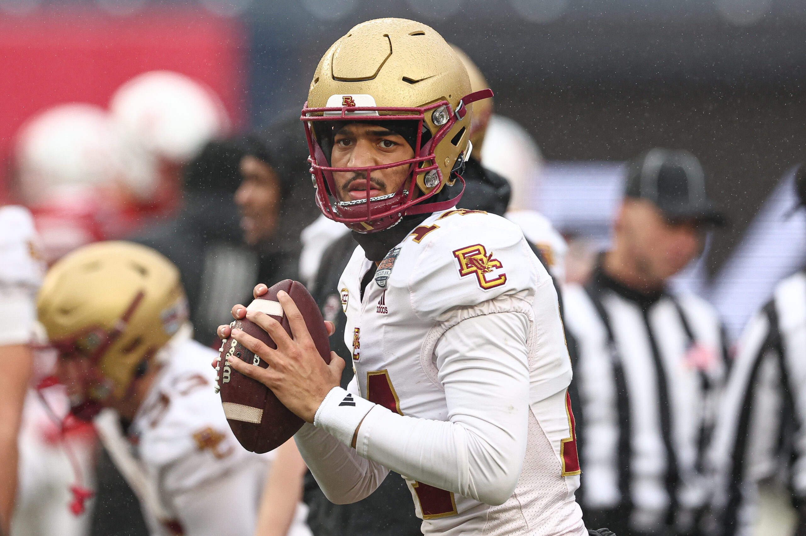 Dec 28, 2024; Bronx, NY, USA; Boston College Eagles quarterback Grayson James (14) warms up before the game against the Nebraska Cornhuskers at Yankee Stadium. Mandatory Credit: Vincent Carchietta-Imagn Images