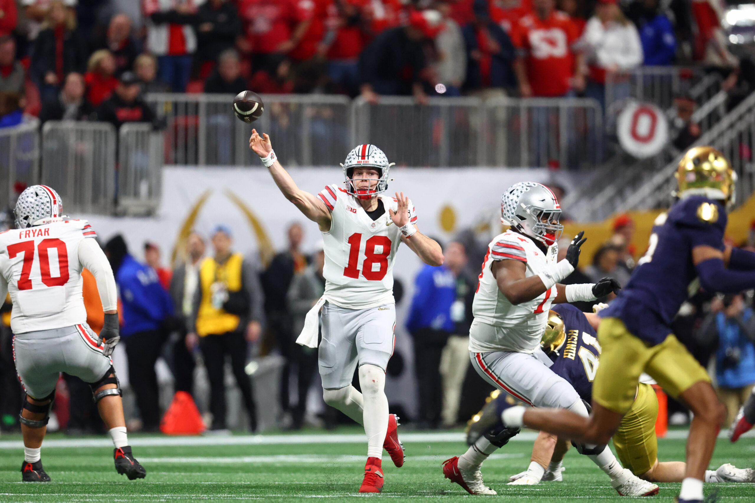 Jan 20, 2025; Atlanta, GA, USA; Ohio State Buckeyes quarterback Will Howard (18) passes the ball against the Notre Dame Fighting Irish during the first half the CFP National Championship college football game at Mercedes-Benz Stadium.
