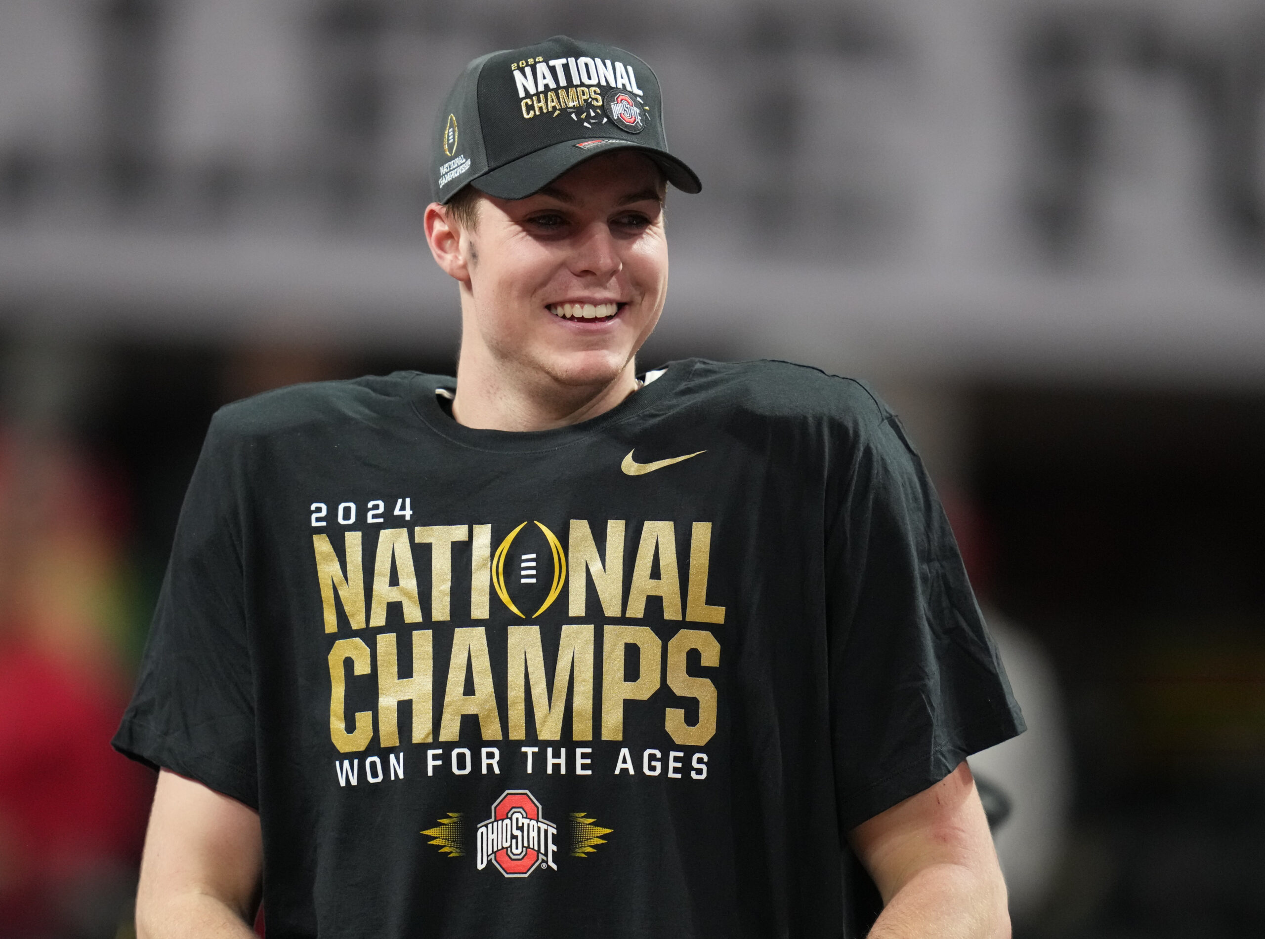 Jan 20, 2025; Atlanta, GA, USA; Ohio State Buckeyes quarterback Will Howard (18) on the podium after defeating the Notre Dame Fighting Irish in the CFP National Championship college football game at Mercedes-Benz Stadium.