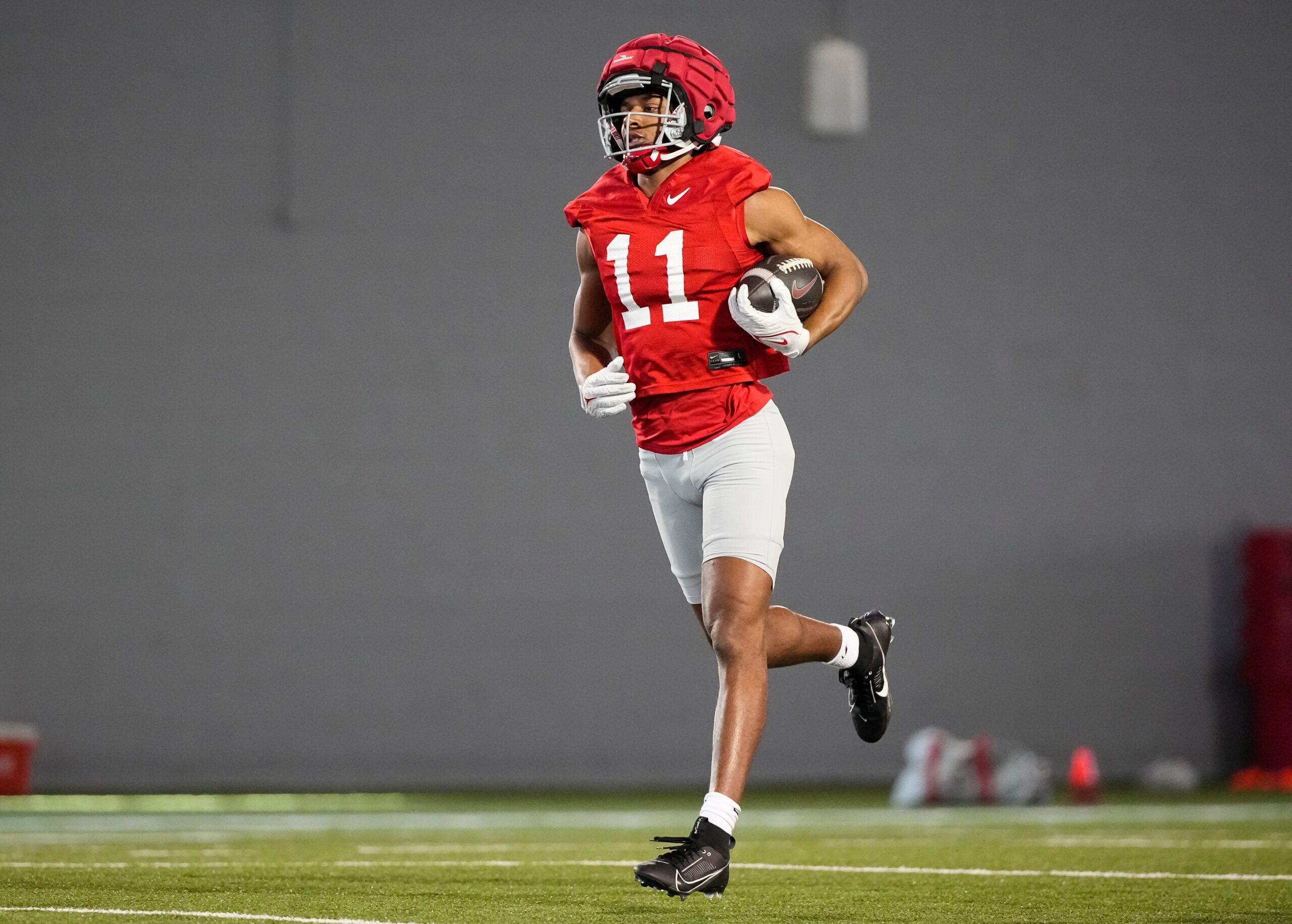 Ohio State Buckeyes wide receiver Quincy Porter (11) runs during spring football practice at the Woody Hayes Athletic Center on March 17, 2025.