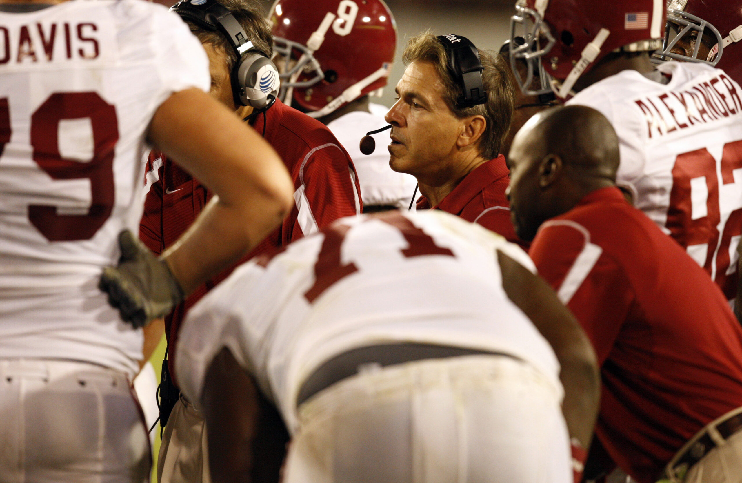 Sep 27, 2008; Athens, GA, USA; Alabama Crimson Tide head coach Nick Saban talks with his team during a time out against the Georgia Bulldogs in the second half at Sanford Stadium. Alabama defeated Georgia 41-30. Mandatory Credit: Dale Zanine- Imagn Images