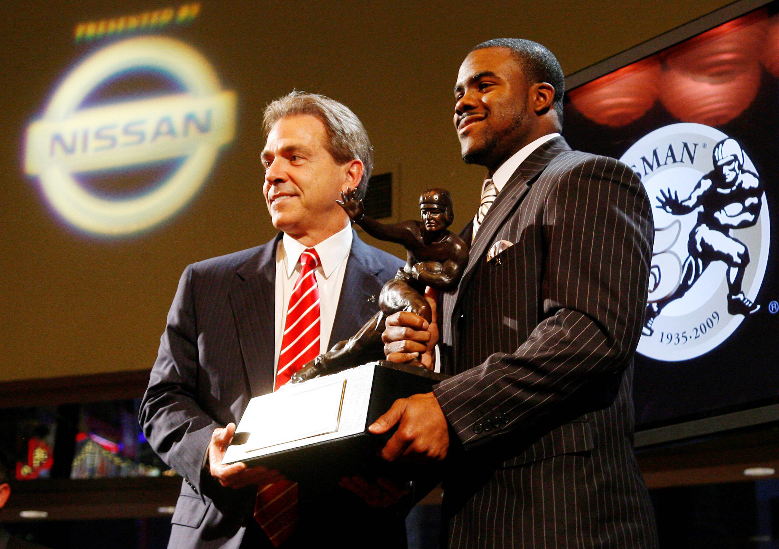 Dec 12, 2009; New York, NY, USA; Alabama Crimson Tide running back Mark Ingram (right) poses with his coach Nick Saban after being awarded the 2009 Heisman Trophy at the Marriott Marquis in New York City.