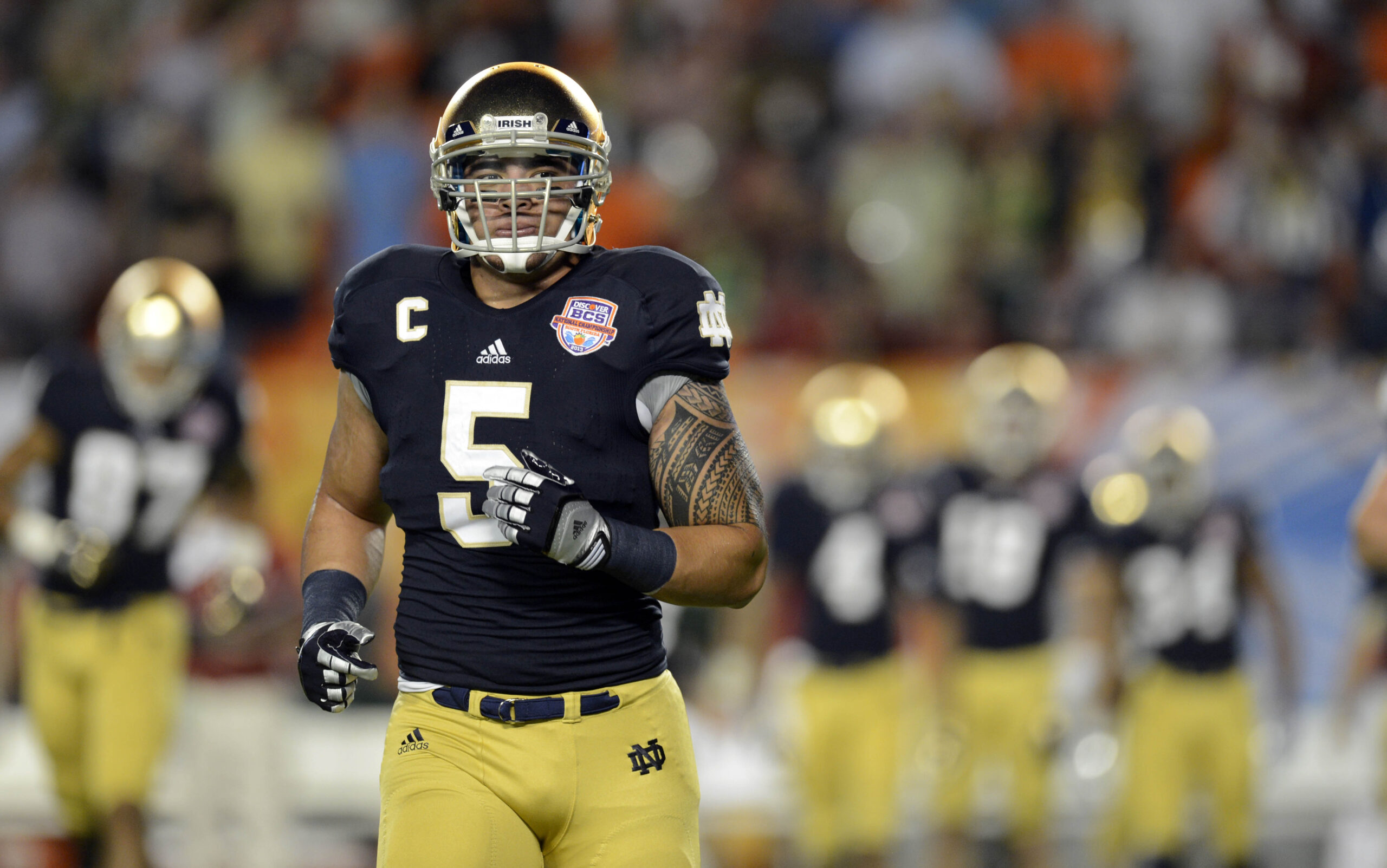 Jan 7, 2013; Miami, FL, USA; Notre Dame Fighting Irish linebacker Manti Te'o (5) warms up before the 2013 BCS Championship game against the Alabama Crimson Tide at Sun Life Stadium.