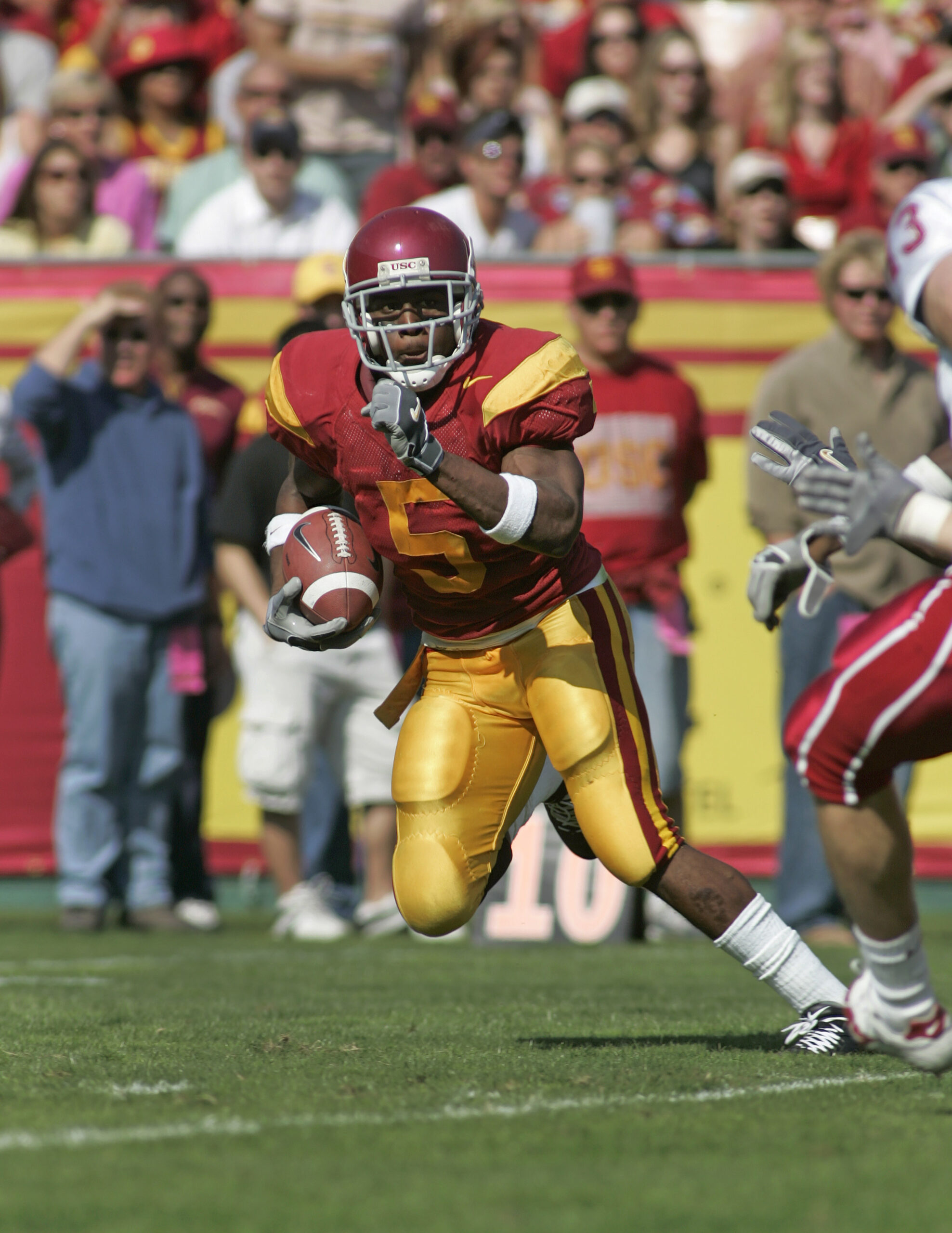 Oct 29, 2005; Los Angeles, CA, USA; FILE PHOTO; Southern California Trojans running back Reggie Bush (5) carries the ball against the Washington State Huskies at the Los Angeles Memorial Coliseum.
