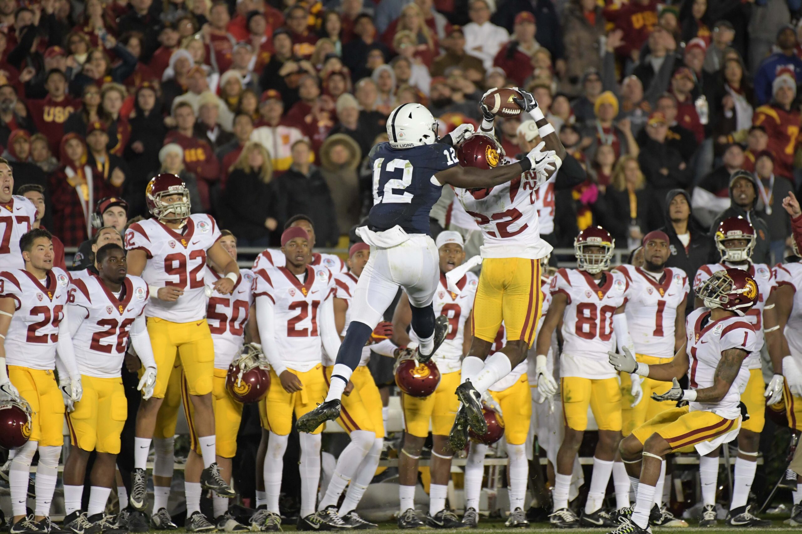 Jan 2, 2017; Pasadena, CA, USA;USC Trojans defensive back Leon McQuay III (22) intercepts a pass intended for Penn State Nittany Lions cornerback Jordan Smith (12) with 42 seconds left during the 103rd Rose Bowl at Rose Bowl. USC defeated Penn State 52-49 in the highest scoring game in Rose Bowl history.