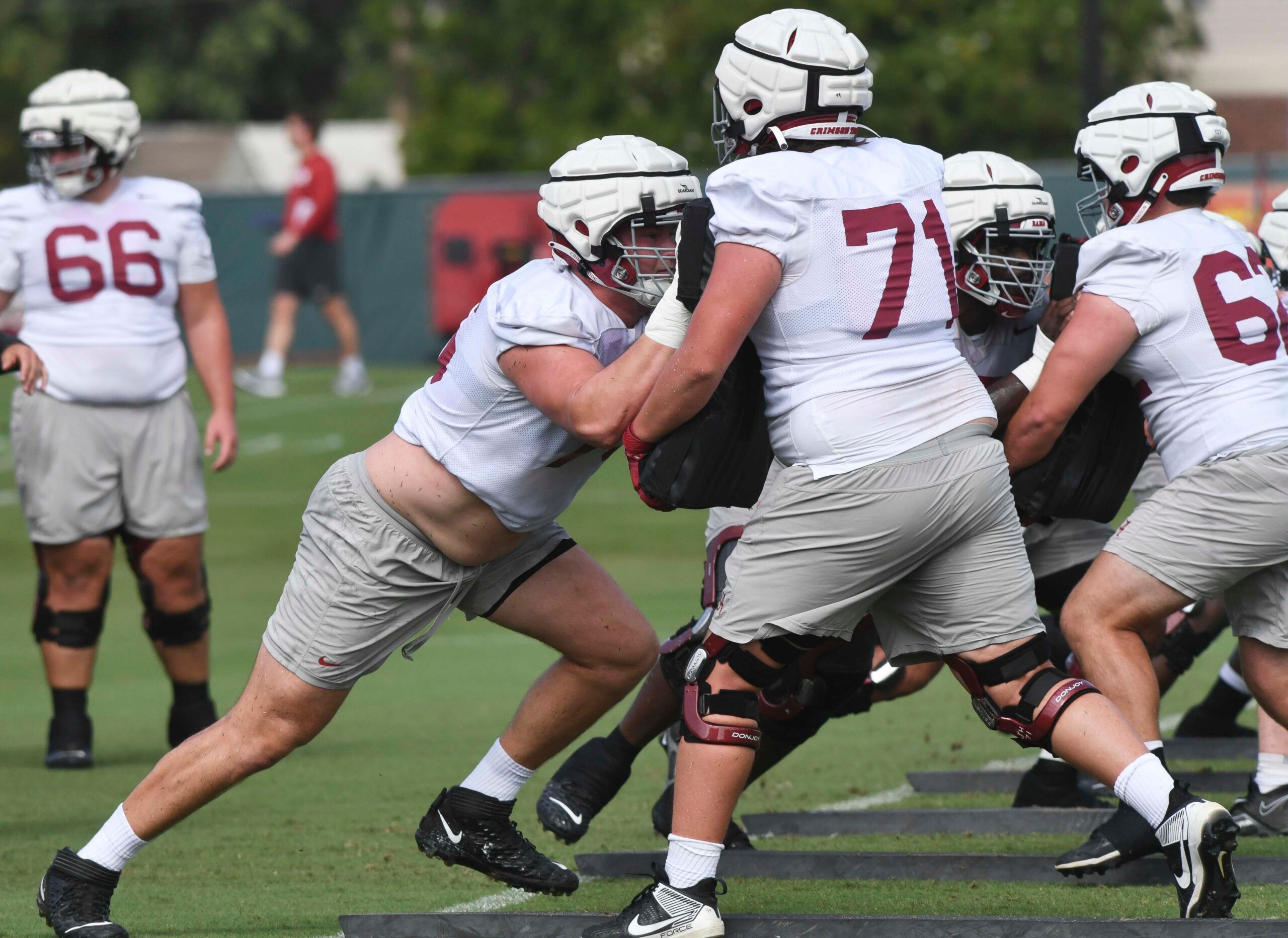 The Crimson Tide football team continued practice Thursday, Aug. 1, 2024, as they prepare for the season opener and the first game under new head coach Kalen DeBoer. Alabama offensive lineman Wilkin Formby (75) works against Alabama offensive lineman Jackson Howell (71).