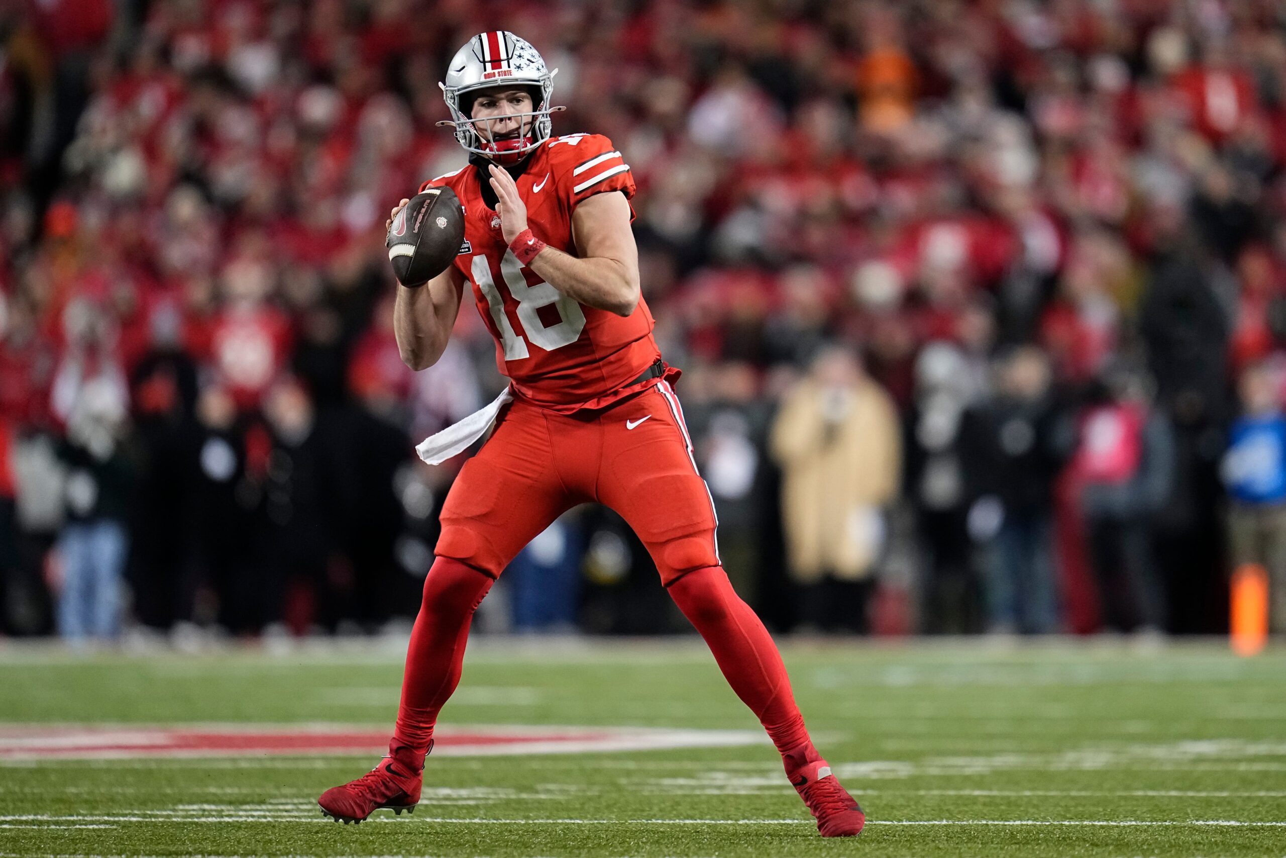 Ohio State Buckeyes quarterback Will Howard (18) throws during the second half of the College Football Playoff first round game against the Tennessee Volunteers at Ohio Stadium in Columbus on Dec. 22, 2024. Ohio State won 42-17.