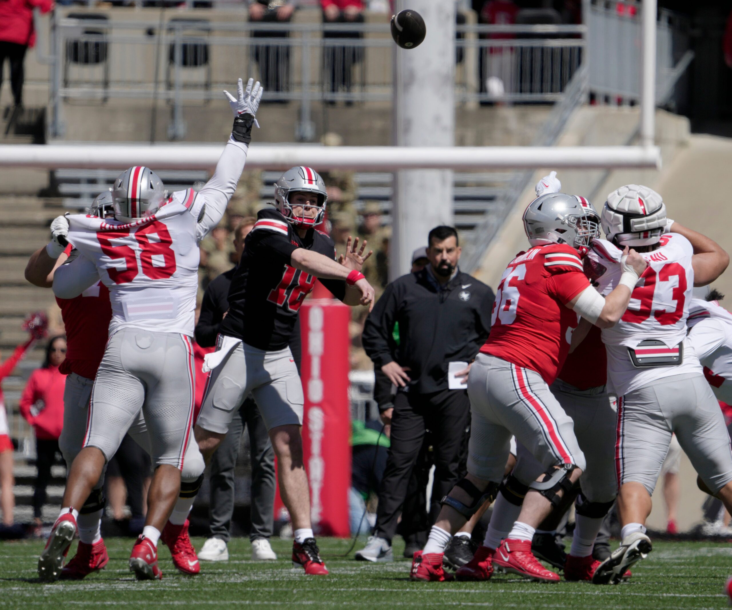April 13, 2024; Columbus, Ohio, USA; Ohio State Buckeyes quarterback Will Howard (18) thorws a pass while playing for the scarlet team during the first half of the LifeSports spring football game at Ohio Stadium on Saturday.