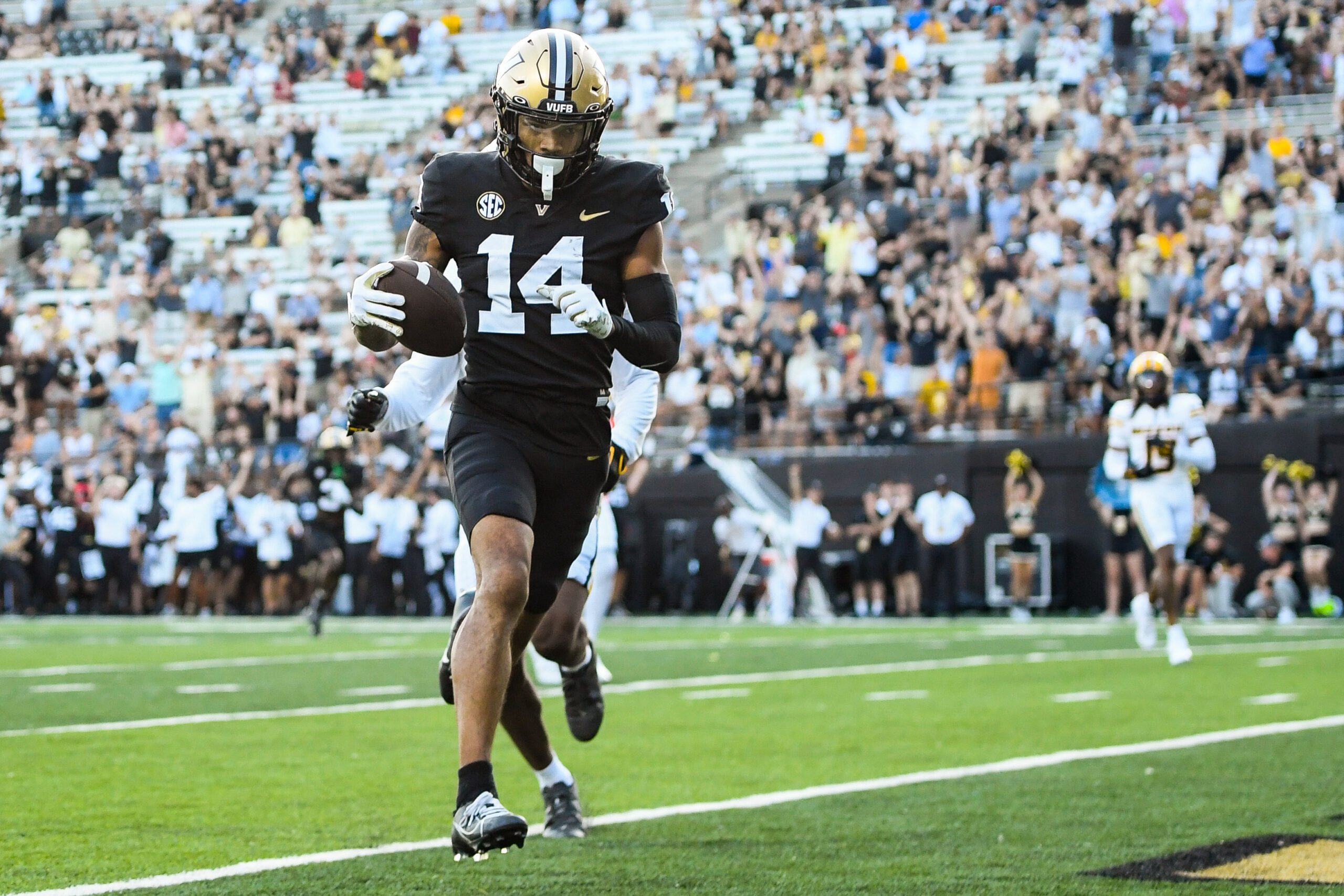 Sep 30, 2023; Nashville, Tennessee, USA; Vanderbilt Commodores wide receiver Will Sheppard (14) scores a touchdown against the Missouri Tigers during the second half at FirstBank Stadium.