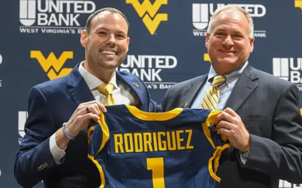 Wren Baker introduces Rich Rodriguez as the program's 36th head coach in school history.