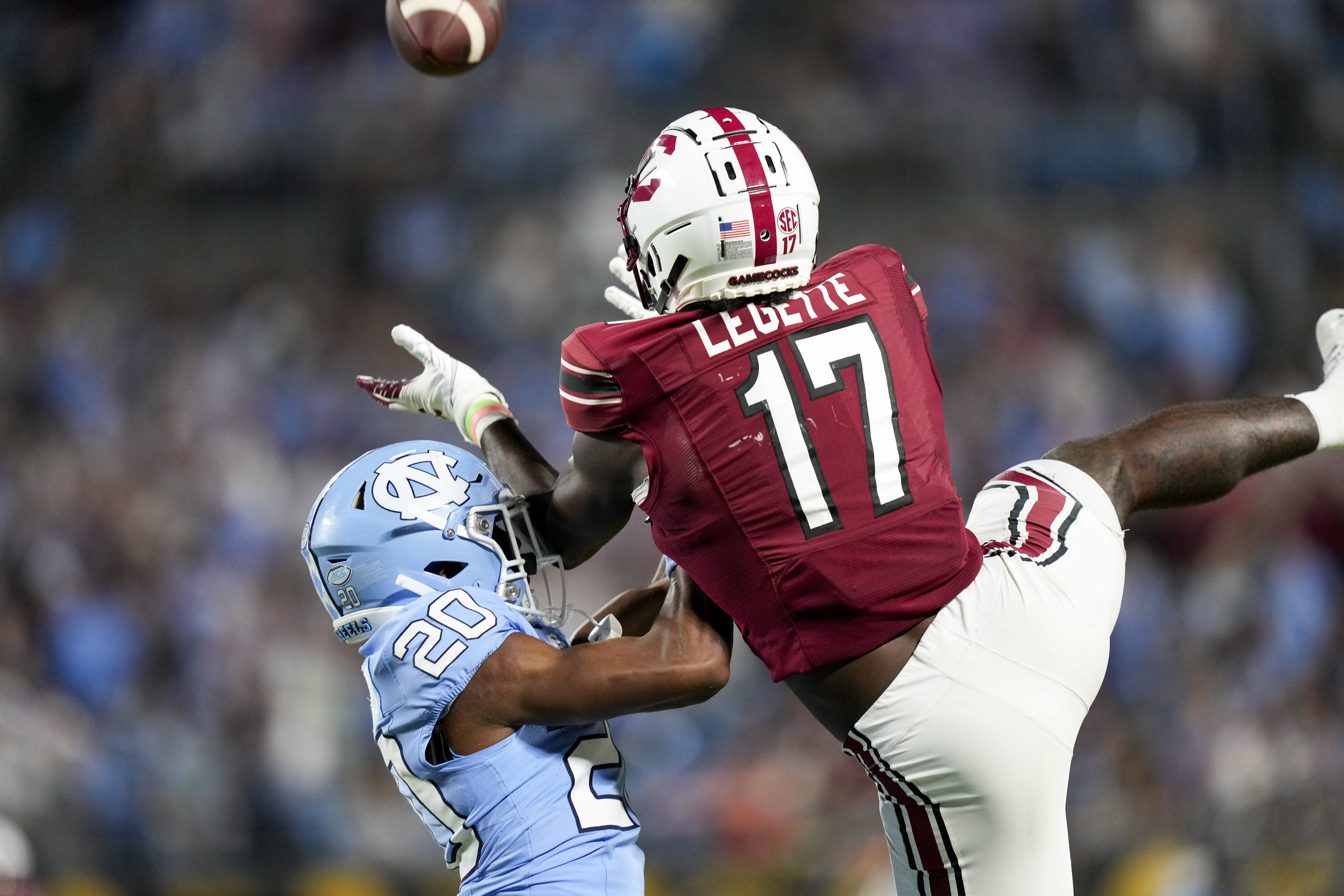 Sep 2, 2023; Charlotte, North Carolina, USA; North Carolina Tar Heels defensive back Tayon Holloway (20) defends against a pass to South Carolina Gamecocks wide receiver Xavier Legette (17) during the second half at Bank of America Stadium.