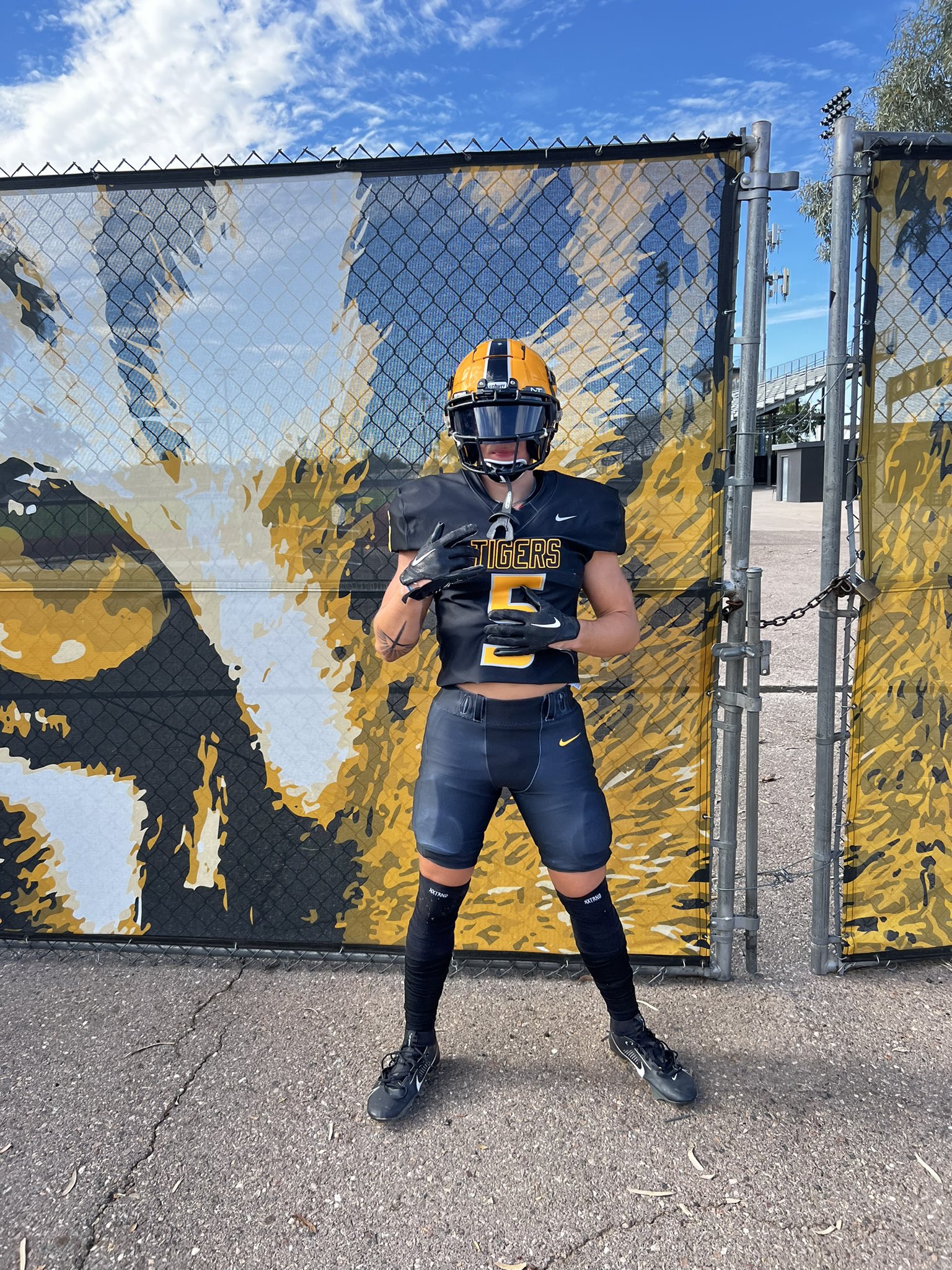2025 3 star RB Zach Thompson from Gilbert, Arizona (Gilbert) poses outside the stadium