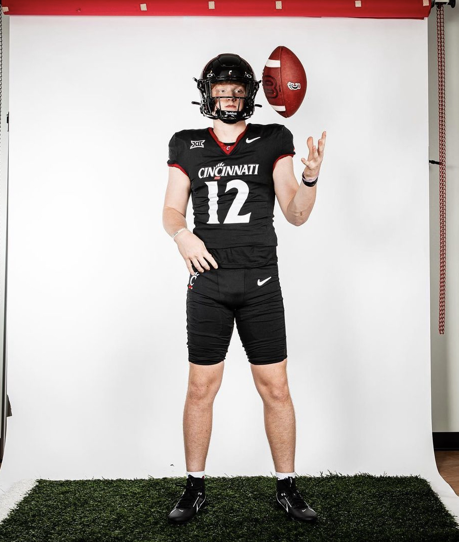 2025 3-Star QB Zebulin Kinsey from Toronto, OH, takes a picture during a visit to Cincinnati