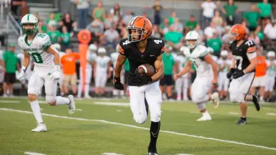 Ironton's Shaun Terry (4) runs the ball as the Ironton High School football team takes on Fairland on Friday September 1