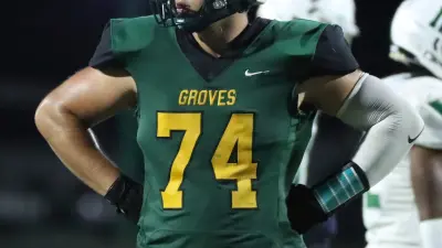 Birmingham Groves offensive lineman Avery Gach lines up against West Bloomfield during second-half action at Birmingham Groves on Thursday