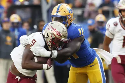 Nov 4, 2023; Pittsburgh, Pennsylvania, USA; Pittsburgh Panthers linebacker Bangally Kamara (11) tackles Florida State Seminoles running back Lawrance Toafili (9) in the backfield during the second quarter at Acrisure Stadium.