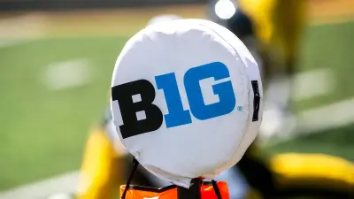 The logo of the Big Ten Conference is seen on a yard marker during Iowa Hawkeyes football Kids Day at Kinnick open practice