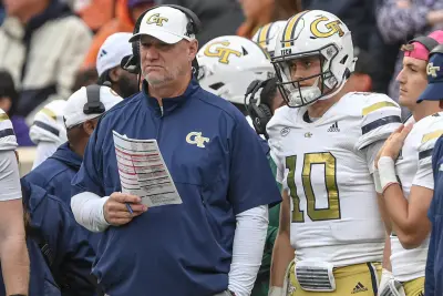 Nov 11, 2023; Clemson, South Carolina, USA; Georgia Tech Yellow Jackets head coach Brent Key and quarterback Haynes King (10) look on during the fourth quarter against the Clemson Tigers at Memorial Stadium.