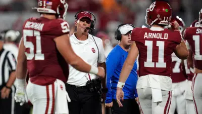 Oklahoma coach Brent Venables stands on the sideline as Oklahoma Sooners quarterback Jackson Arnold (11) walks off he field after a fumble during a college football game between the University of Oklahoma Sooners (OU) and the Tennessee Volunteers at Gaylord Family - Oklahoma Memorial Stadium in Norman