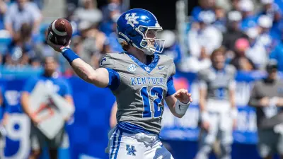 Kentucky quarterback Brock Vandagriff (12) dropped back for a pass during the Kentucky Wildcats' Blue White scrimmage at Kroger Field on Saturday afternoon in Lexington
