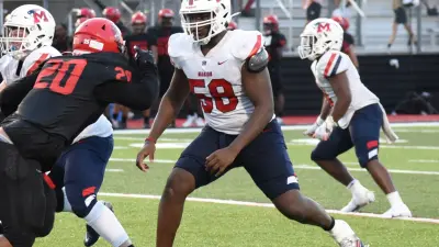 Four-star 2025 Offensive Tackle Carius Curne from Marion