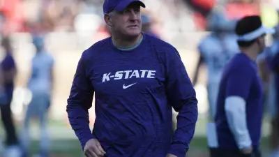 Kansas State's head coach Chris Klieman walks along the sidelines before the game against Texas Tech