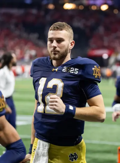 Jan 20, 2025; Atlanta, GA, USA; Notre Dame Fighting Irish quarterback CJ Carr (12) against the Ohio State Buckeyes during the CFP National Championship college football game at Mercedes-Benz Stadium.