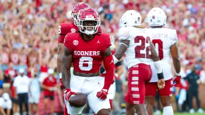 Deion Burks (6) runs drills during an Oklahoma football practice in Norman