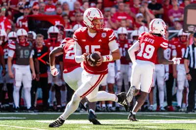 Oct 5, 2024; Lincoln, Nebraska, USA; Nebraska Cornhuskers quarterback Dylan Raiola (15) throws a pass against the Rutgers Scarlet Knights during the second quarter at Memorial Stadium.