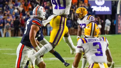 LSU Tigers linebacker Harold Perkins Jr. (40) makes an interception against LSU as the Auburn Tigers take on the LSU Tigers at Jordan-Hare Stadium in Auburn