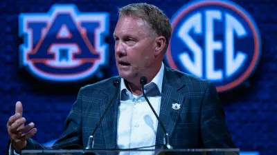 Auburn coach Hugh Freeze speaks at the 2023 SEC Football Kickoff Media Days at the Nashville Grand Hyatt on Broadway
