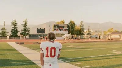 2025 MFS 2-Star QB Draiden Trudeau from Mission Viejo (CA) looking at the scoreboard before a game