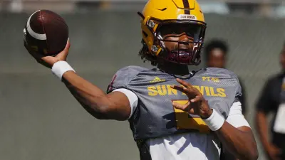 Arizona State Sun Devils quarterback Jaden Rashada (5) throws a pass to tight end Jalin Conyers (12) against the Southern Utah Thunderbirds in the first half at Mountain America Stadium in Tempe on Aug. 31