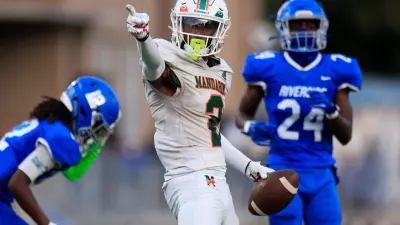 Mandarin's Jaime Ffrench Jr. (2) reacts to a first down pick up against Riverside's King Taylor (12) and Ronald "RJ" Bertrand (24) during the second quarter of a regular season high school football matchup Friday