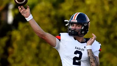 Nashville Christian quarterback Jared Curtis (2) passes as he warms up before an high school football scrimmage against Franklin Road Academy Friday