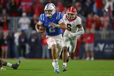 Jan 2, 2025; Jacksonville, FL, USA; Mississippi Rebels quarterback Jaxson Dart (2) celebrates after beating the Duke Blue Devils in the Gator Bowl at EverBank Stadium.
