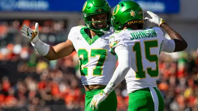 Oregon running back Jayden Limar celebrates a touchdown with Oregon wide receiver Tez Johnson as the Oregon State Beavers host the Oregon Ducks Saturday