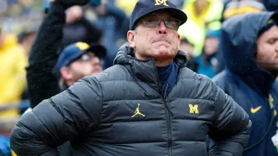 Michigan coach Jim Harbaugh looks on from the sidelines during the Wolverines' game against Indiana on Oct. 14