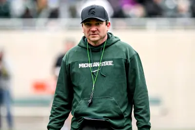Michigan State's head coach Jonathan Smith walks to the sideline during the Spring Showcase on Saturday, April 20, 2024, at Spartan Stadium in East Lansing.