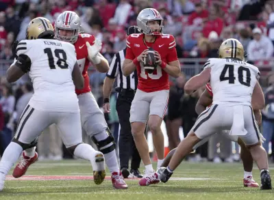 Nov 9, 2024; Columbus, Ohio, USA; Ohio State Buckeyes quarterback Julian Sayin (10) looks for an open man during the second half at Ohio Stadium.