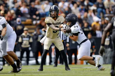 Apr 19, 2025; Boulder, CO, USA; Colorado Buffaloes quarterback Kaidon Salter (3) hands the ball off to running back Titus Bautista (34) during the spring game at Folsom Field.