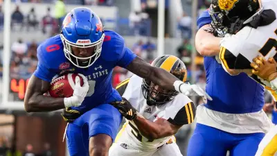 Tennessee State's Karate Brenson (0) runs with the ball during the Southern Heritage Classic game between Tennessee State University and University of Arkansas at Pine Bluff in Memphis