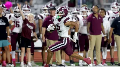 Jenks' Kaydin Jones runs for a touchdown during the high school football game between Norman North and Jenks at Harve Collins Field in Norman